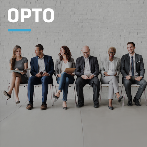 A diverse group of six professionals sitting in a row, engaged in conversation, with the word 'OPTO' prominently displayed in bold white letters at the top, symbolizing an inclusive and dynamic workplace.